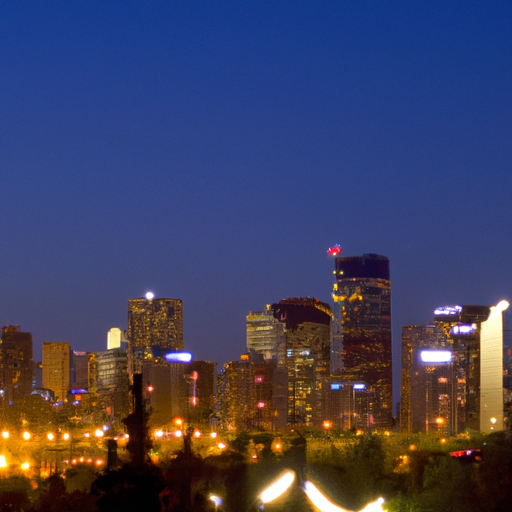 a photograph of a downtown city skyline at night