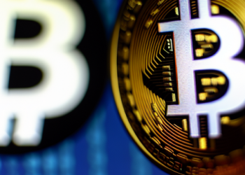 Bitcoin logo prominently displayed on a computer screen