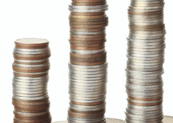 Piles of coins stacked in increasing order representing growth of personal investments